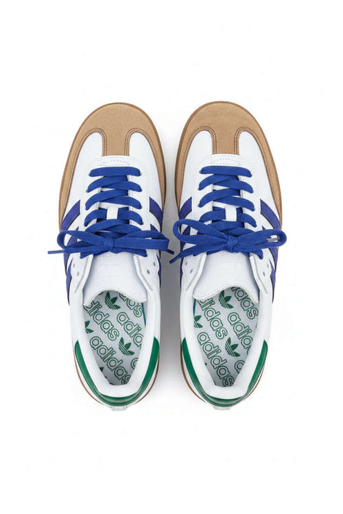 Scarpe Adidas ergonomiche con suola beige e lacci blu, ideali per sportivi e attività fisica.