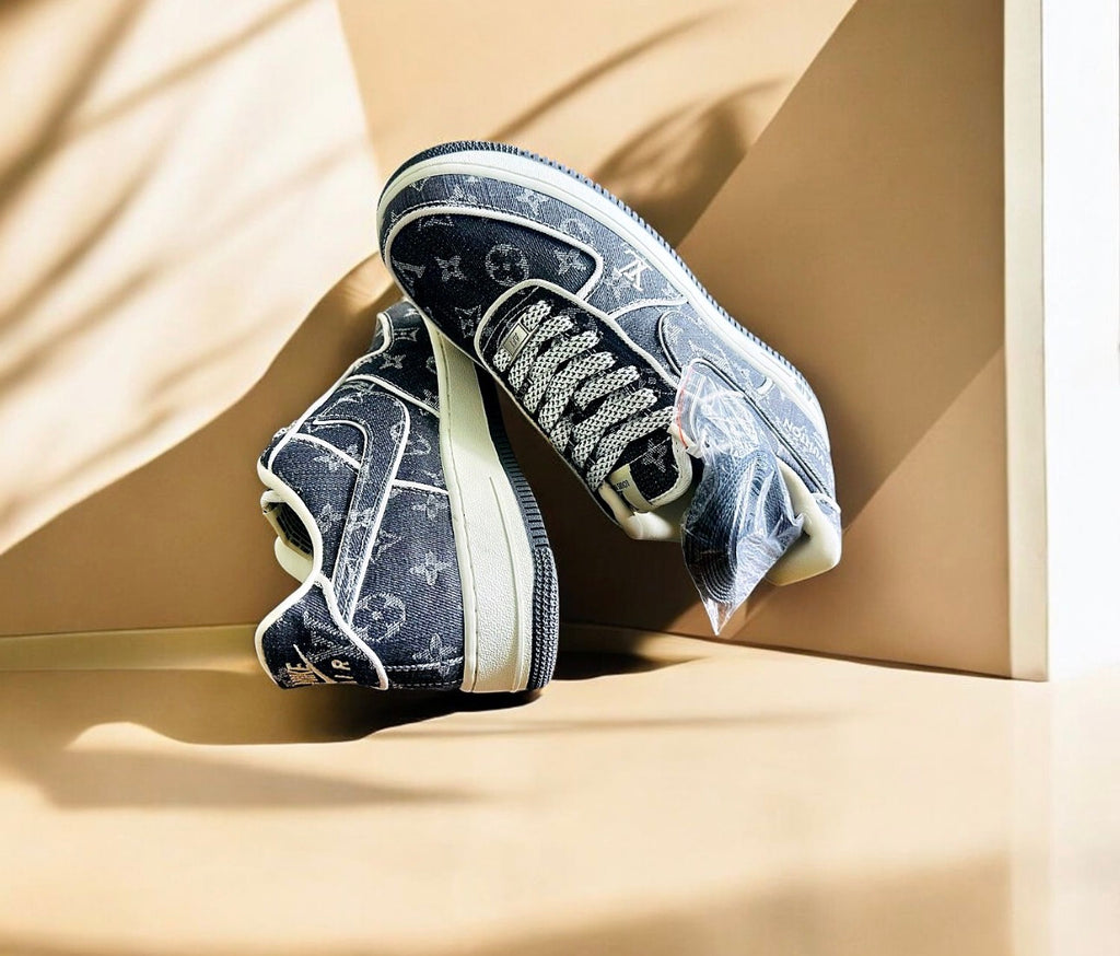 Nike ergonomic sports shoes featuring a stylish blue design with logo patterns and high-quality materials.