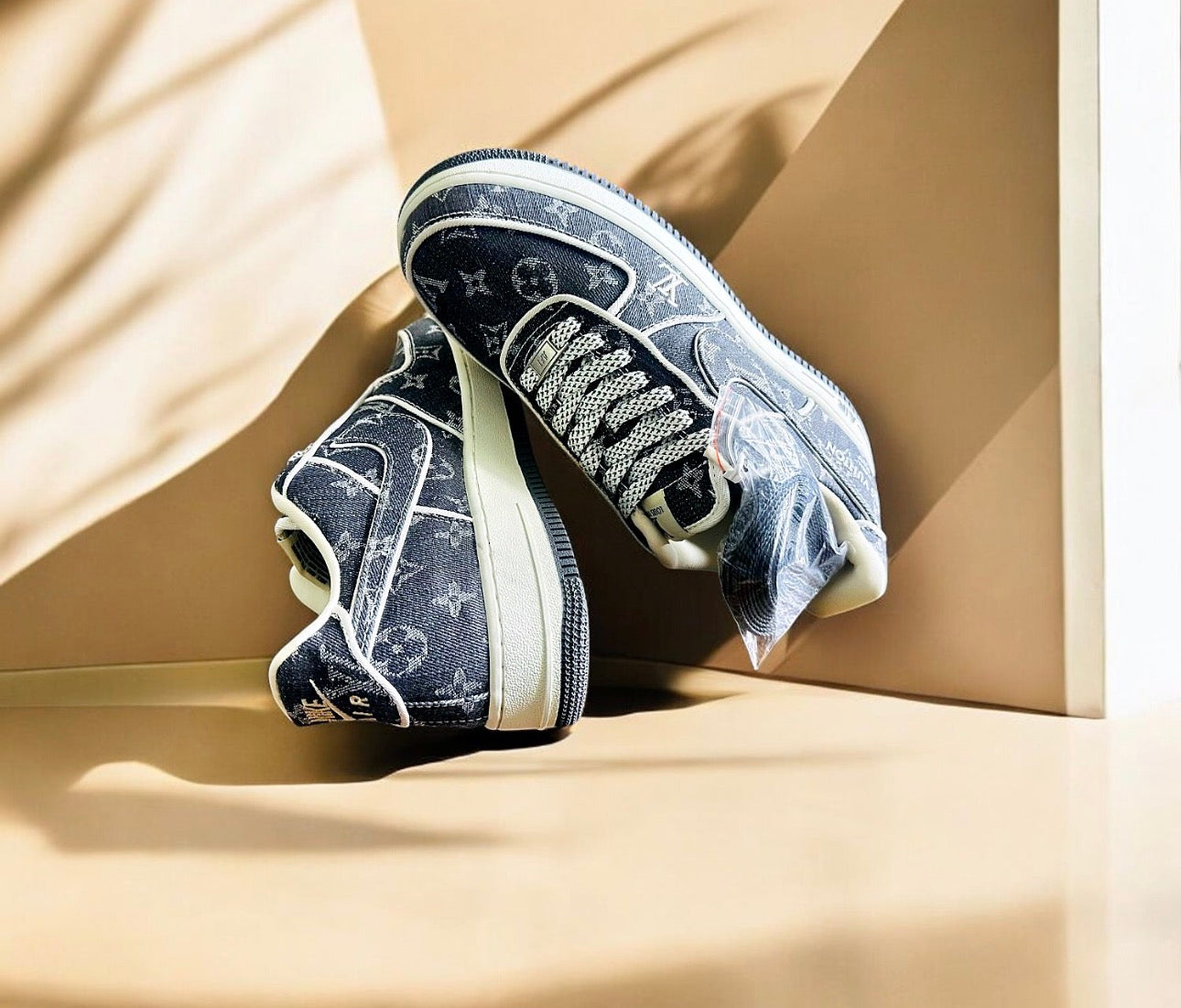 Nike ergonomic sports shoes featuring a stylish blue design with logo patterns and high-quality materials.