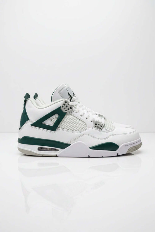 Scarpe Jordan per sport, design bianco e verde, perfette per attività atletica e comfort ottimale.