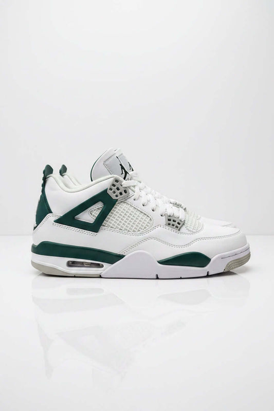 Scarpe Jordan per sport, design bianco e verde, perfette per attività atletica e comfort ottimale.