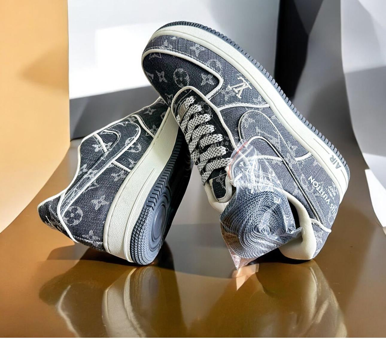 Nike ergonomic sports shoes in stylish gray design with unique patterns and comfortable sole.